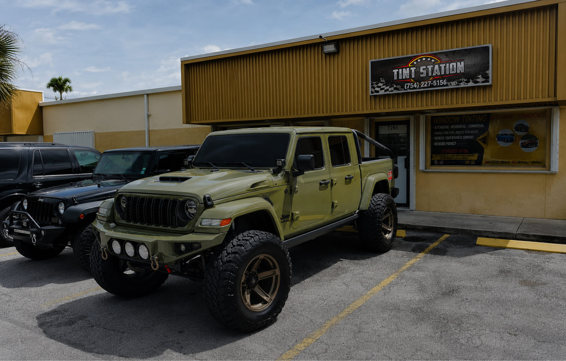 Jeep parked outside the Tint Station shop at 236 SW 12th Ave, Deerfield Beach, after window tinting