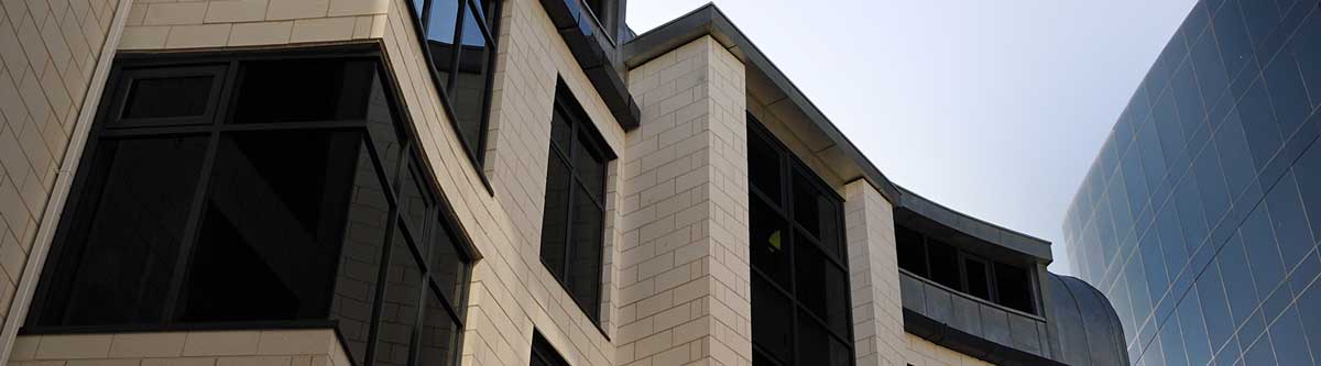 Commercial building glass in South Florida with solar window film installed by Tint Station